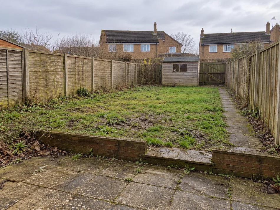 Neglected existing garden before landscaping and garden design work begins.