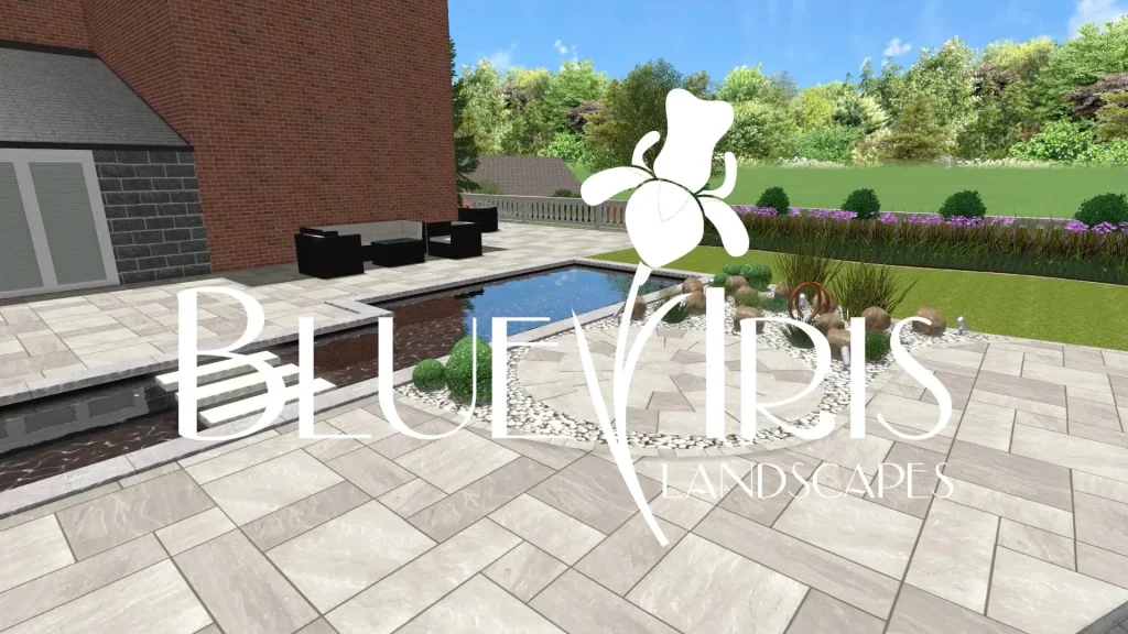 Backyard landscape with a rectangular pool, stone-tiled patio, and black outdoor seating beside a brick wall; company logo 'Bluebird's Landscapes' overlaid in white.